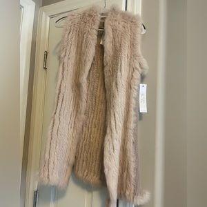 Blush color …Rabbit fur vest new never worn with tags.